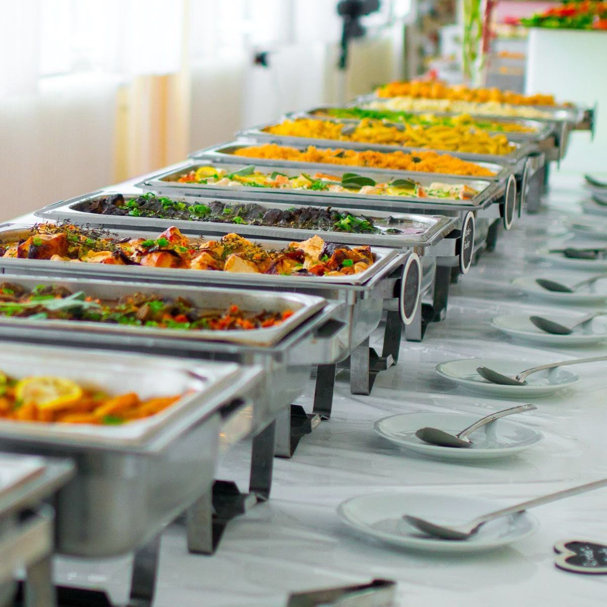 Jite's Kitchen catering setup with assorted Nigerian dishes